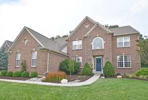 Brick home with front walk - Team Results Realty